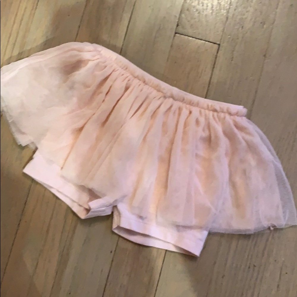 little bike Shorts & a soft tulle tutu attached.